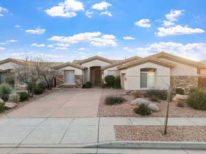 View of home with two car garage