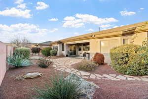 Back of property with a patio area