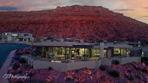 Back house at dusk with a mountain view