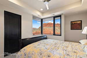 Bedroom featuring views and ensuite bath