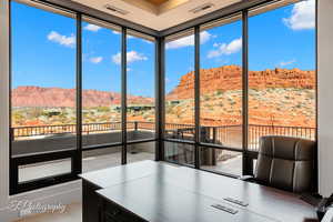 Corner office featuring a mountain view