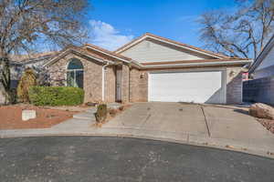 Ranch-style home featuring a garage