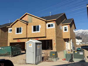 View of front of house with a mountain view