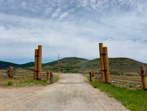 View of road featuring a mountain view and a rural view