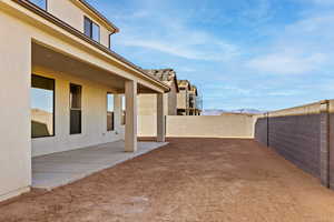 View of yard with a patio area