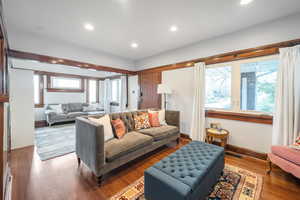 Living room with wood-type flooring