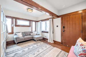 Living room with hardwood / wood-style floors