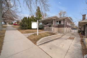 View of front of property featuring a garage