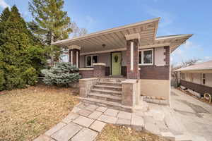 View of front of house with covered porch