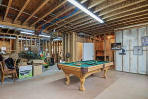 Recreation room with billiards and concrete floors