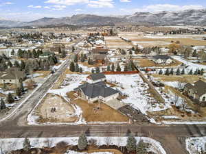 Snowy aerial view with a mountain view