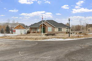 View of front of home with a garage