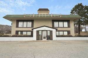 View of front of property featuring a mountain view