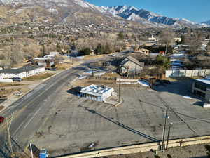 Birds eye view of property with a mountain view