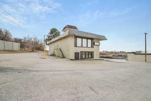 Back of property featuring central air condition unit