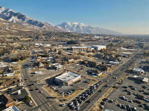 Birds eye view of property with a mountain view