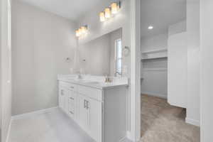 Bathroom with vanity and tile patterned flooring