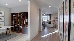 Hallway featuring light wood-type flooring