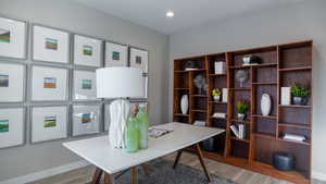 Office with light wood-type flooring