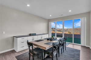 Dining space featuring wood-type flooring