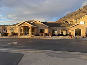 View of front of Clubhouse with a mountain view