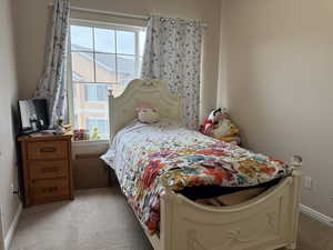 Third Bedroom Carpeted bedroom with multiple windows