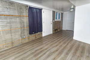 Interior space with hardwood / wood-style floors