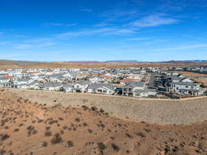 Birds eye view of property with a mountain view