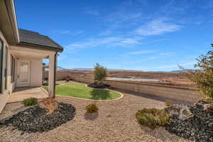 View of yard featuring a mountain view and a patio area