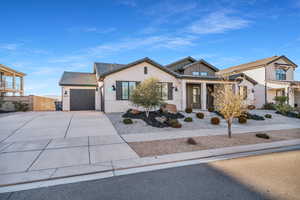 Craftsman inspired home featuring a garage