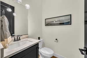 Bathroom with vanity and toilet