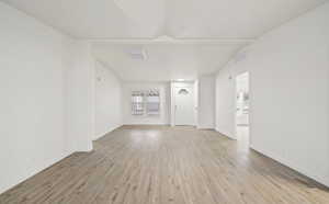 Unfurnished room featuring light wood-type flooring