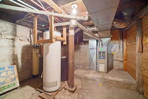 Basement featuring heating unit