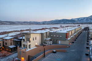 Snowy aerial view with a mountain view