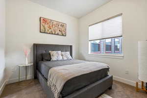 Bedroom featuring carpet flooring