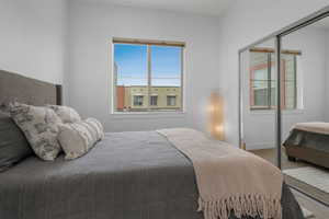 Bedroom featuring a closet and carpet flooring