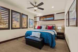 Bedroom with carpet and ceiling fan