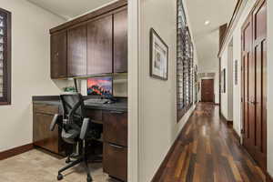 Hall with hardwood / wood-style flooring