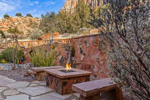 View of patio / terrace featuring a fire pit