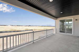 View of patio with a mountain view