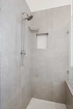 Bathroom with tiled shower