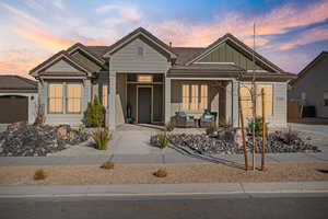 View of front of property featuring a garage