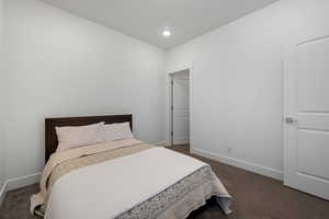 View of carpeted bedroom