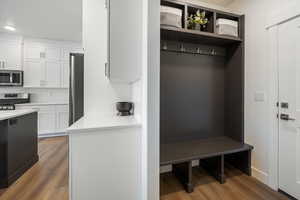 Mudroom featuring hardwood / wood-style floors