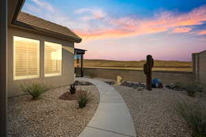 View of yard at dusk