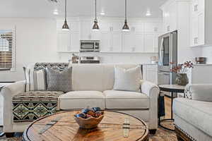 Living room with hardwood / wood-style floors