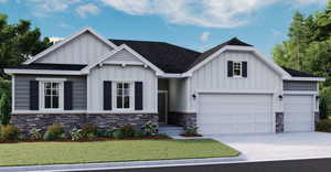 View of front of home with a garage and a front lawn