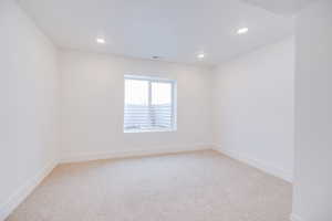 Unfurnished room featuring carpet floors