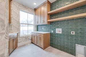 Kitchen featuring light tile patterned floors