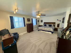 Large & bright master bedroom with 3 windows & sitting area